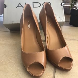 Peep toe high heel shoes